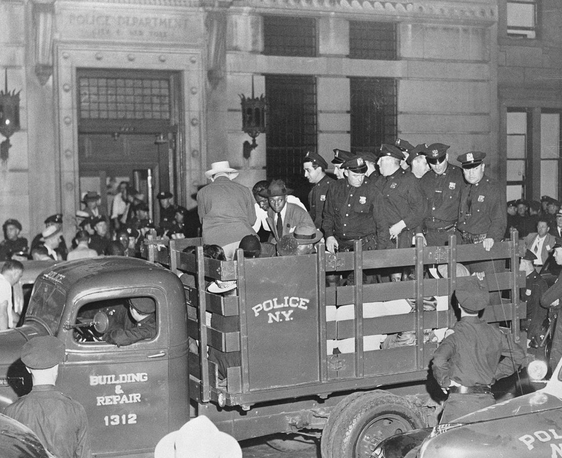 Suspects in a Harlem "race riot" were driven to jail in August 1943.