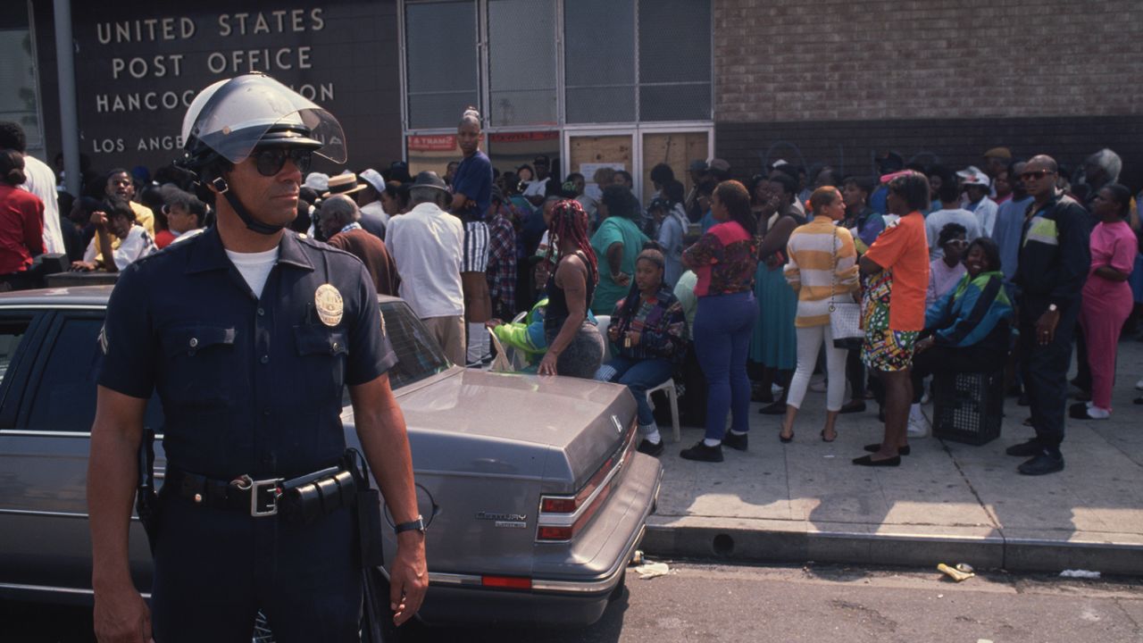 Demonstrators gather near the Los Angeles post office during the 1992 riots.