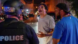 A man argues with a police officer during the protest against the deaths of Breonna Taylor by Louisville police and George Floyd by Minneapolis police, in Louisville, Kentucky, on June 1.