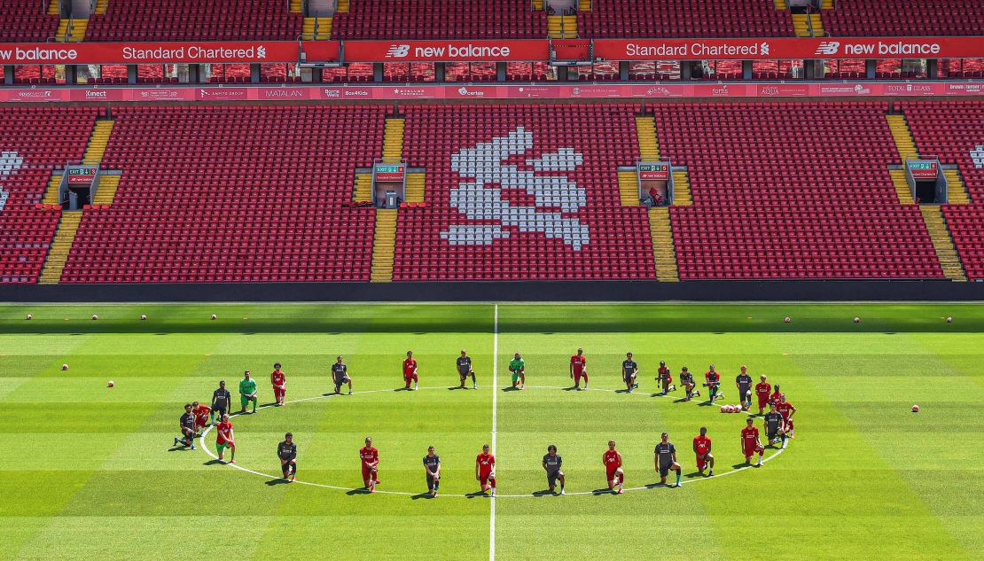 Liverpool players take a knee in memory of George Floyd.