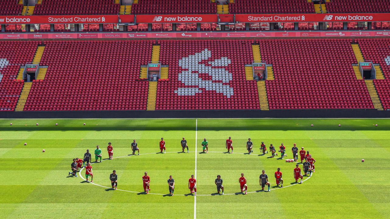 Liverpool players take a knee in memory of George Floyd.