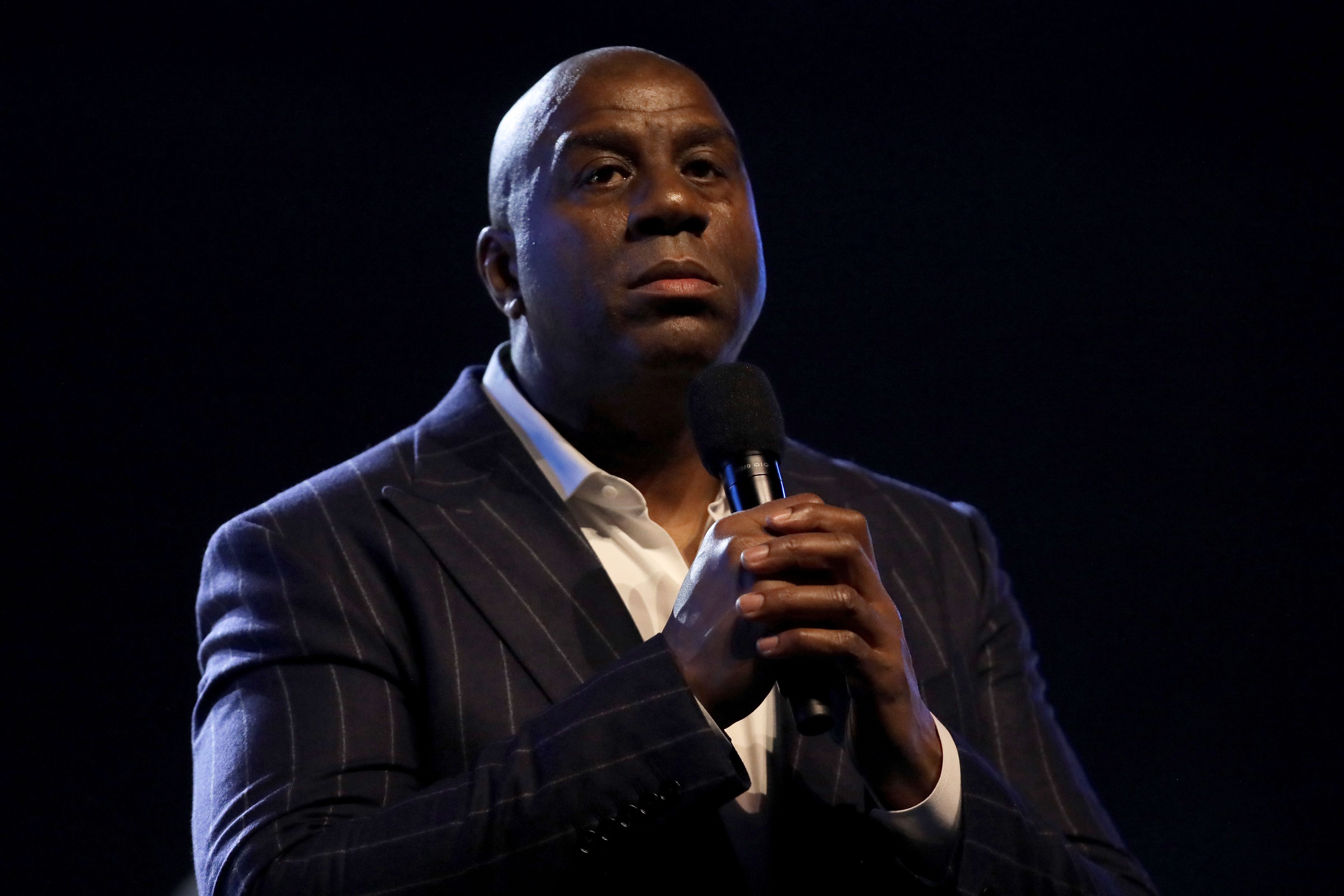 Magic Johnson Shares His Admiration For Son EJ: “He's Saving A Lot Of  People's Lives”