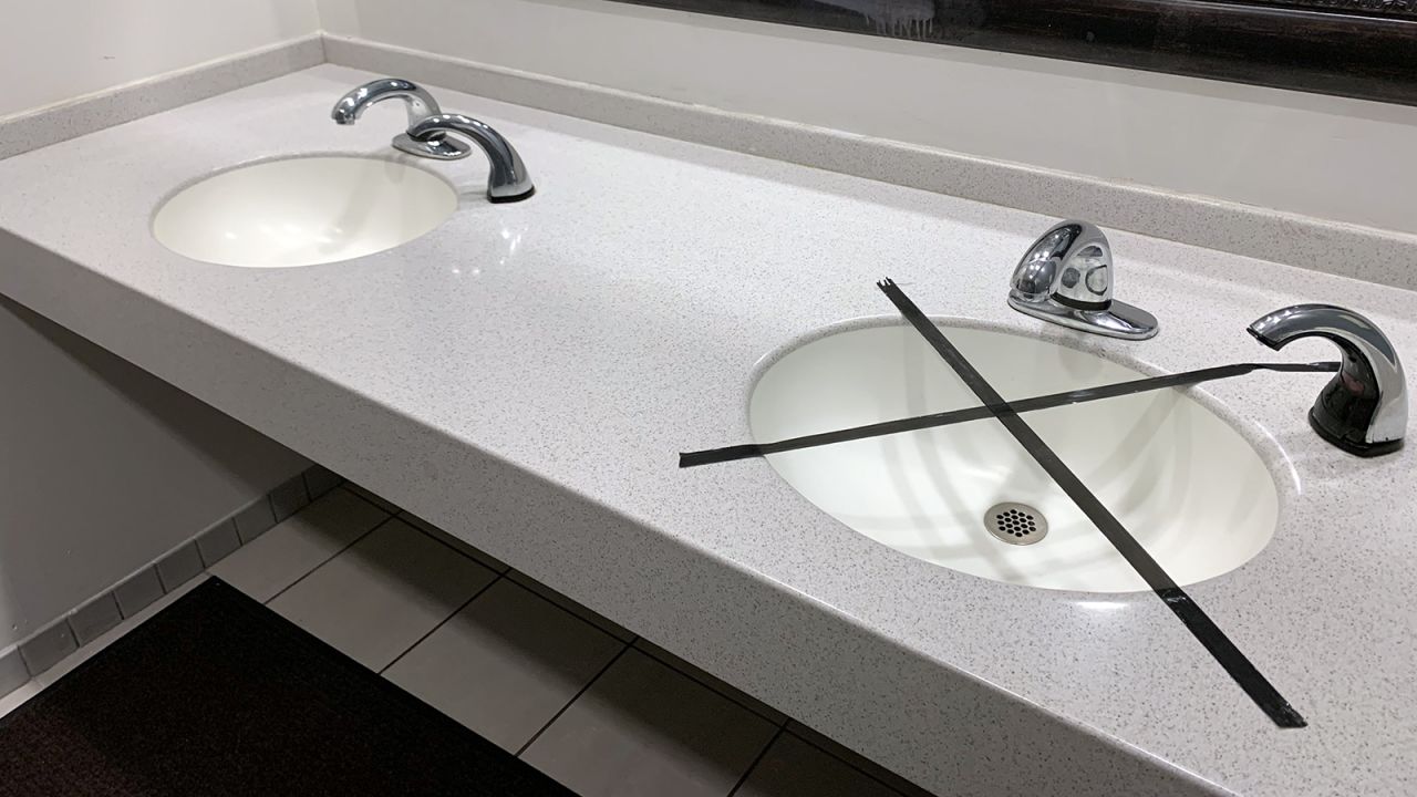 A sink in a bathroom in Allen, Texas on May 1, 2020 is closed off to enforce social distancing.