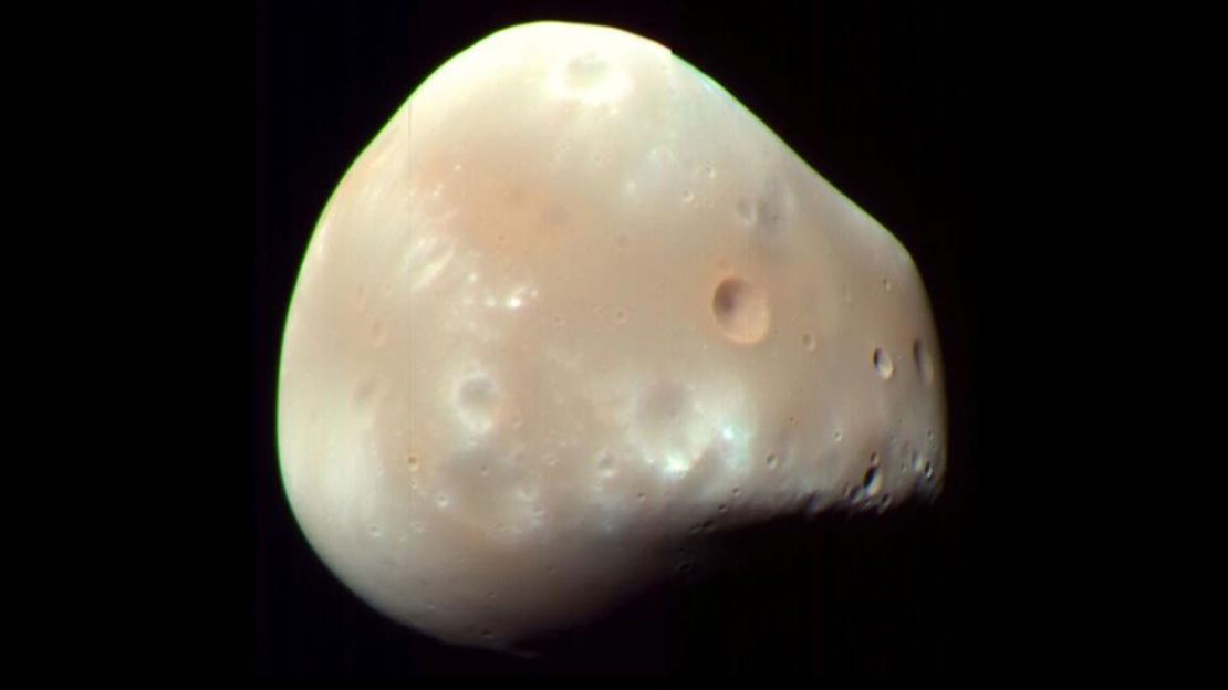 This is a color-enhanced view of Deimos taken by the High Resolution Imaging Science Experiment camera on NASA's Mars Reconnaissance Orbiter.