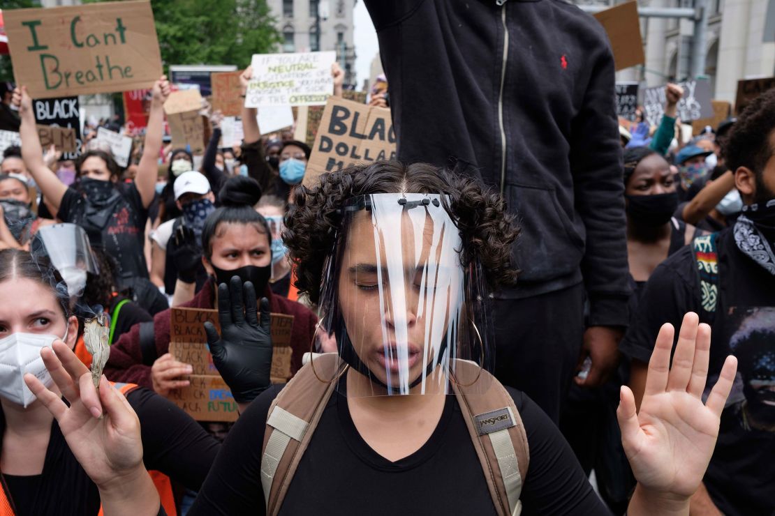 Demonstrators march against police brutality on Tuesday in New York. 