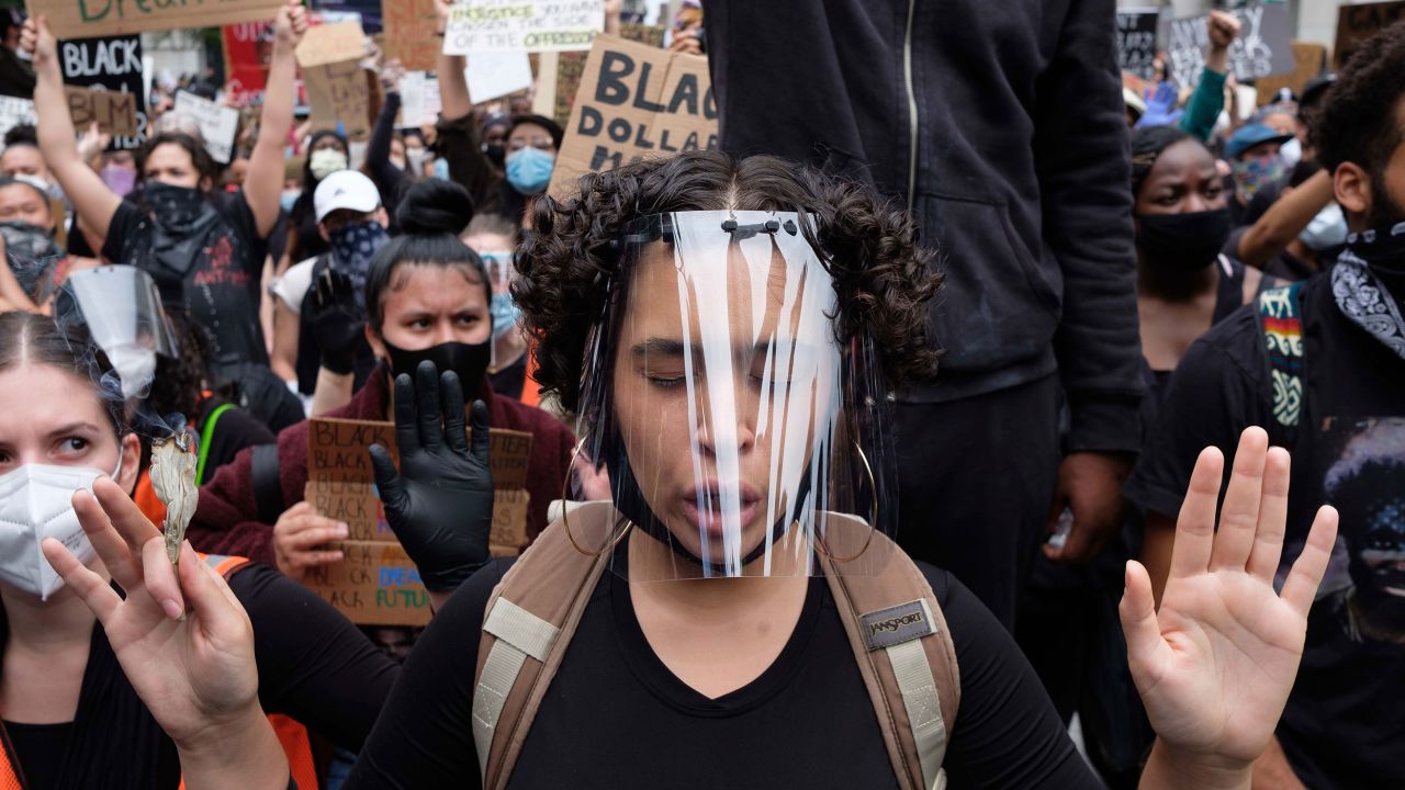 Demonstrators march against police brutality on Tuesday in New York.