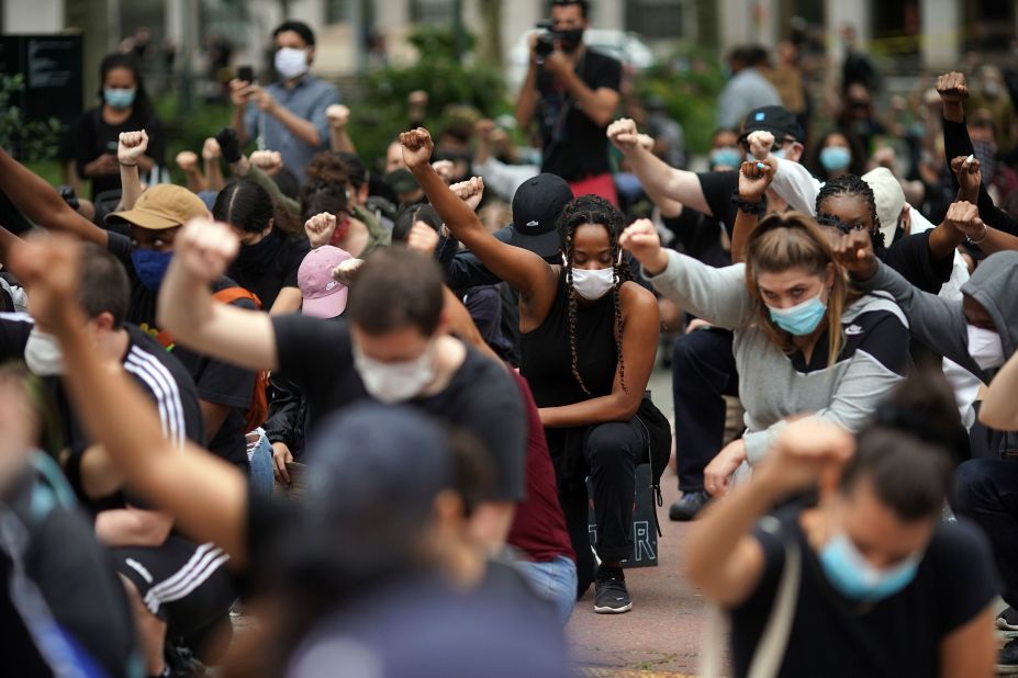 Protesters raise their fists in New York City on June 2.