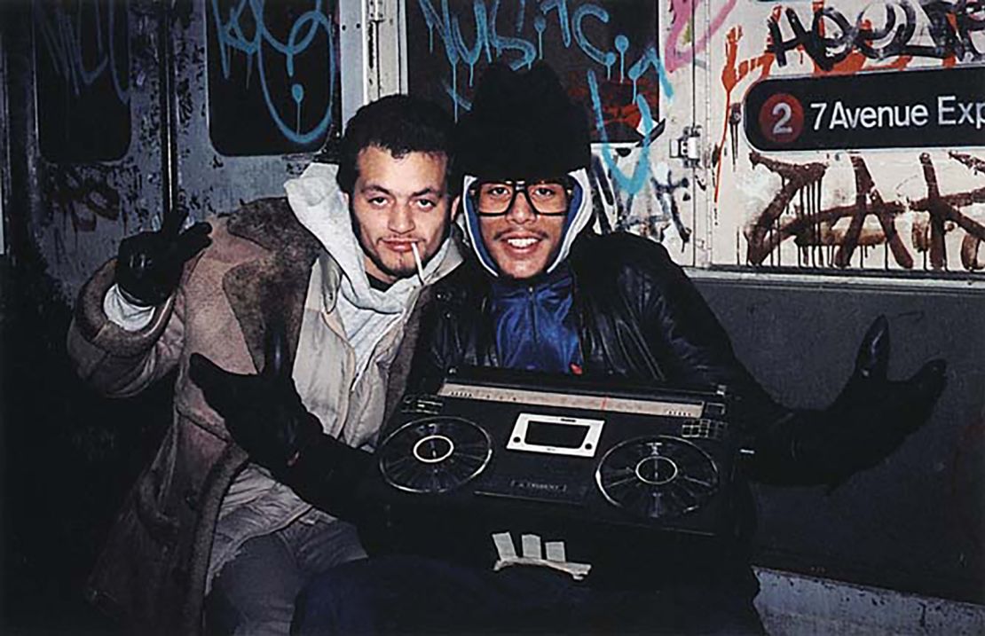 Shabazz often captured the city's youth culture against a backdrop of graffiti art.