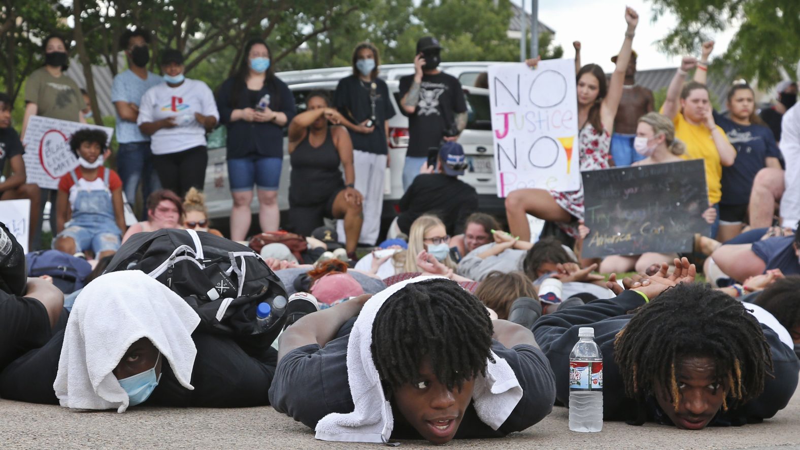 Demonstrators lie face-down outside the Norman Police Department in Oklahoma on Tuesday. 