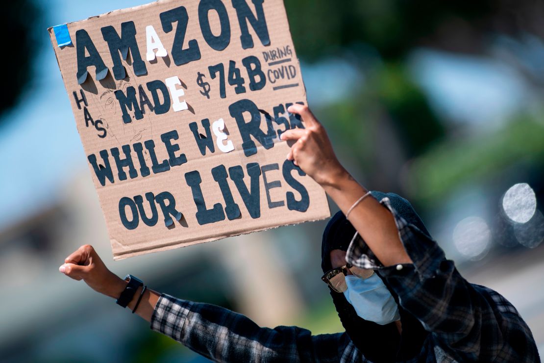 Workers protest against the failure from their employers to provide adequate protections in the workplace of the Amazon delivery hub on National May Day Walkout/Sickout by workers at Amazon, Whole Foods, Innstacart and Shipt amid the Covid-19 pandemic on May 1, 2020, in Hawthorne, California.