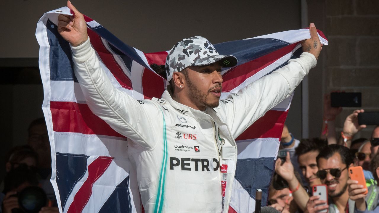 Lewis Hamilton celebrates being crowned F1 world champion last year.