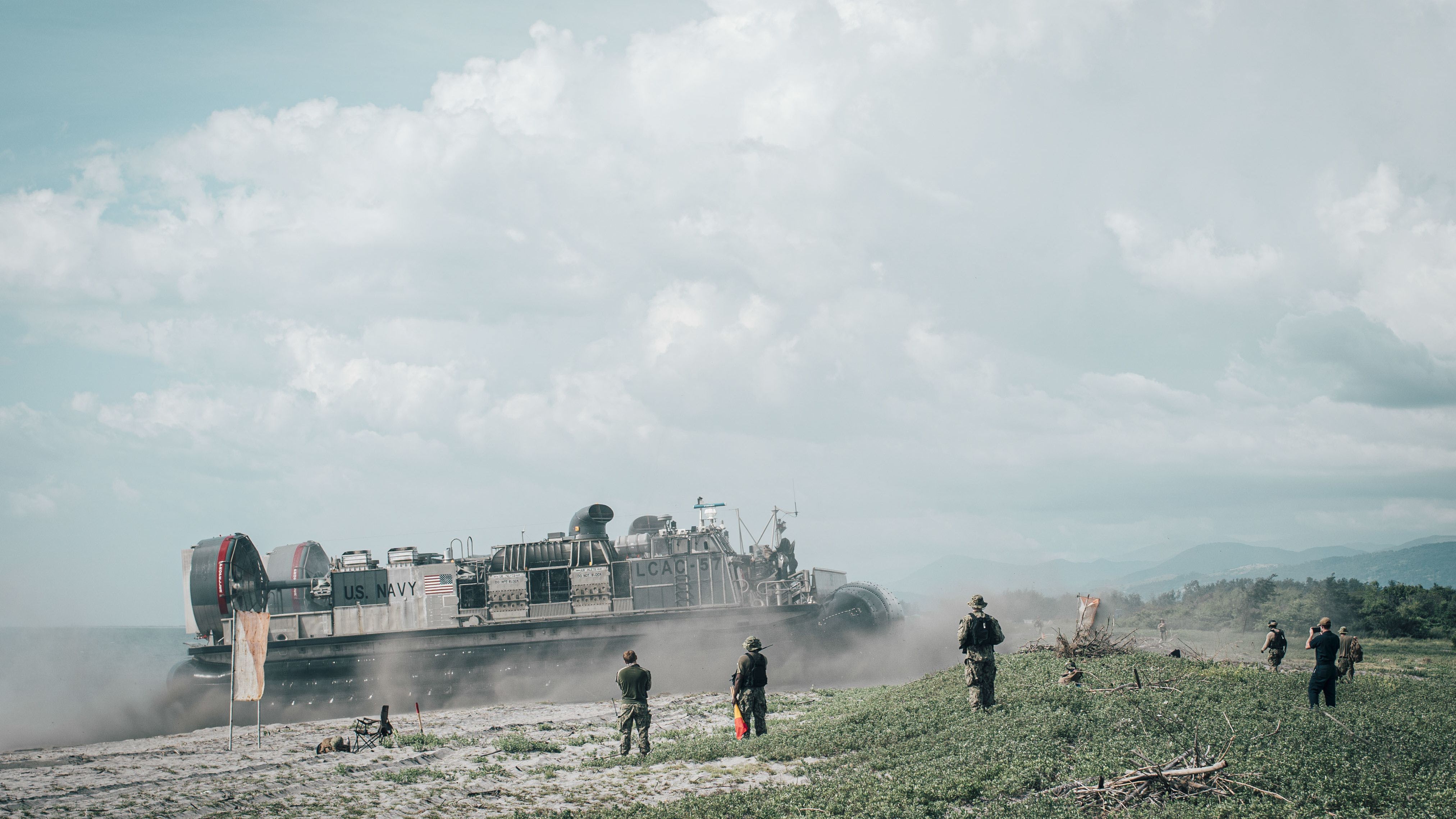 A US Navy landing craft brings US Marines ashore at the Naval Education Training Center, Philippines, during an amphibious offload in support of exercise KAMANDAG 3, Oct. 9, 2019.