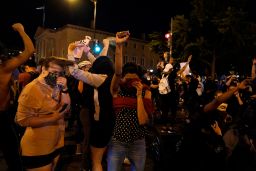 Demonstrators react as a helicopter circles low as people gather to protest the death of George Floyd, Monday, June 1, 2020, near the White House in Washington. Floyd died after being restrained by Minneapolis police officers. (AP Photo/Evan Vucci)