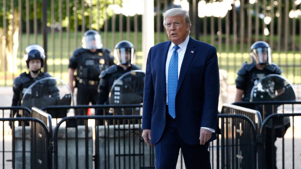 President Donald Trump walks in Lafayette Park to visit outside St. John's Church across from the White House Monday, June 1, 2020, in Washington. Part of the church was set on fire during protests on Sunday night.