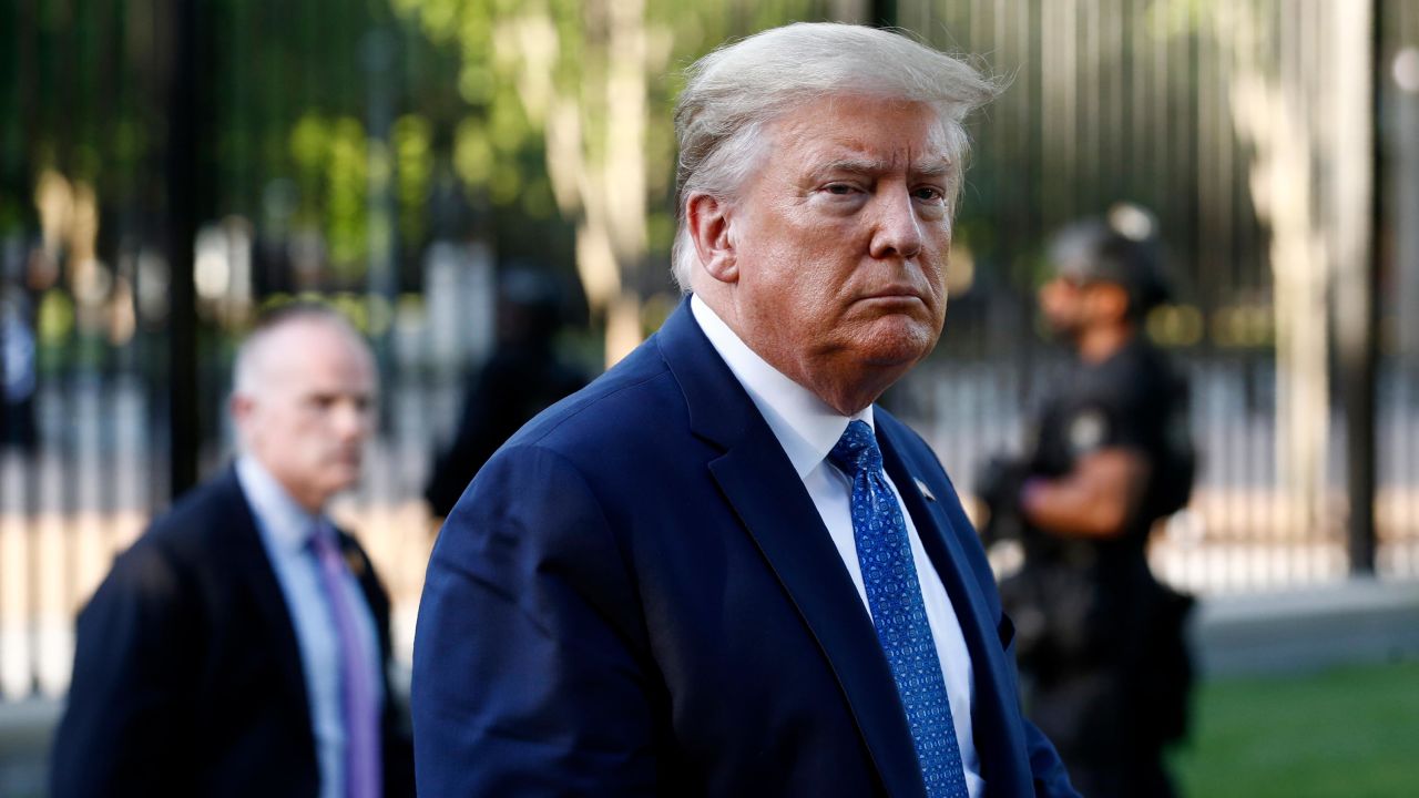 President Donald Trump returns to the White House after visiting outside St. John's Church, Monday, June 1, 2020, in Washington. Part of the church was set on fire during protests on Sunday night.