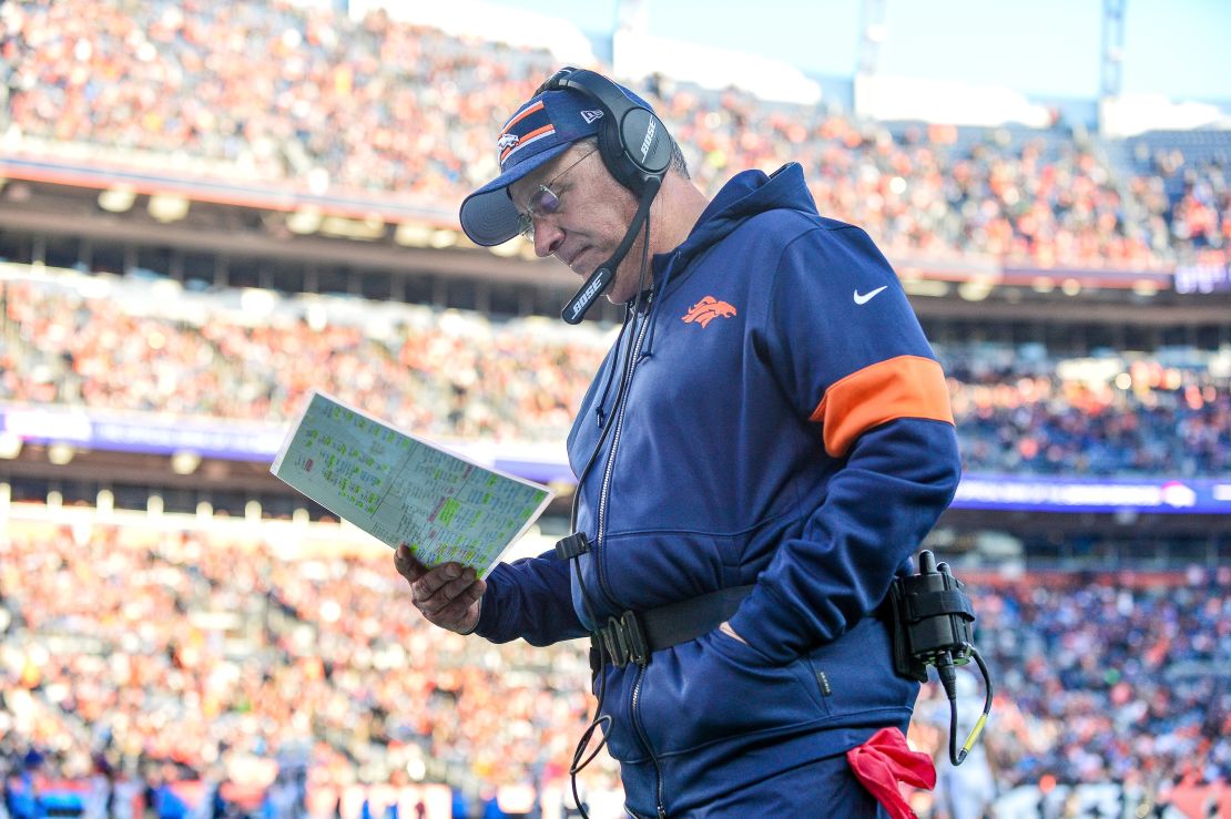 Fangio walks along the sideline during a game against the Los Angeles Chargers.