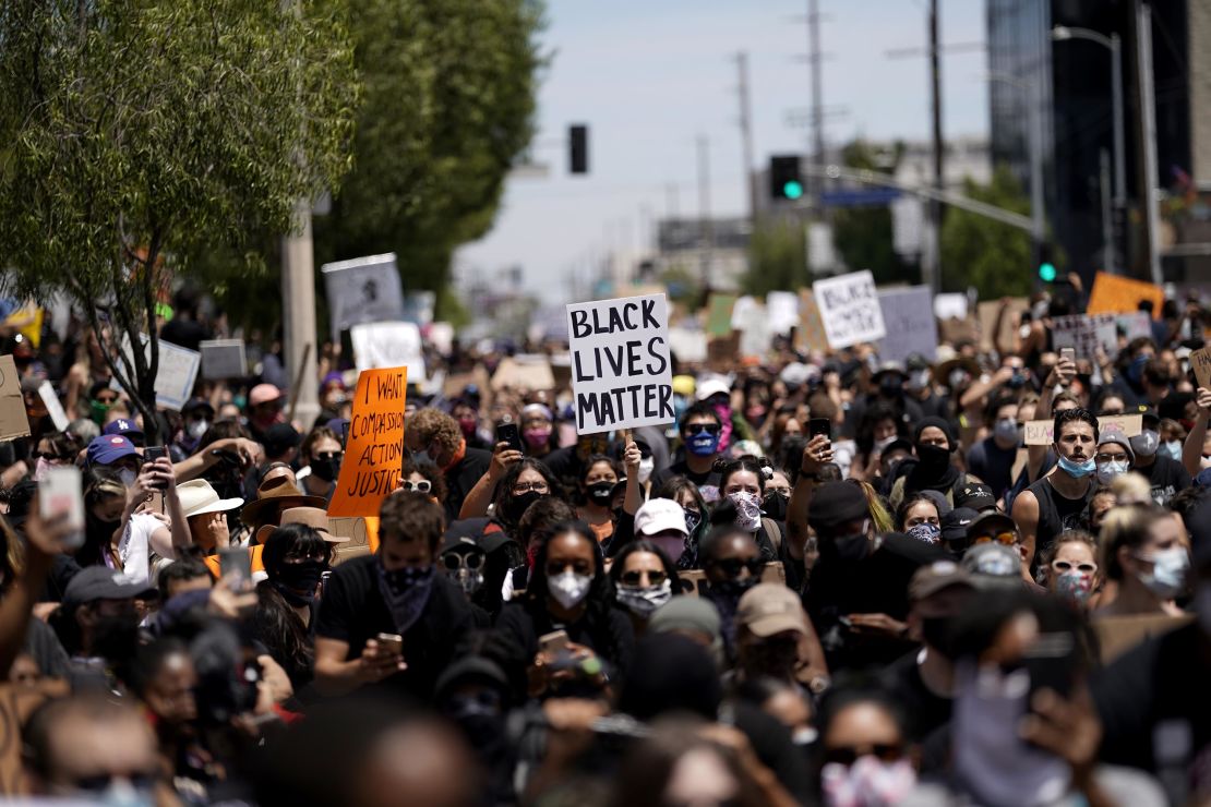 People protest on Saturday, May 30, in Los Angeles.