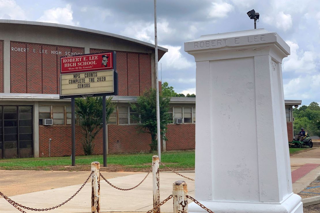 A pedestal that held a statue of Robert E. Lee stands empty outside a high school named for the Confederate general in Montgomery, Ala. on Tuesday, June 2, 2020.