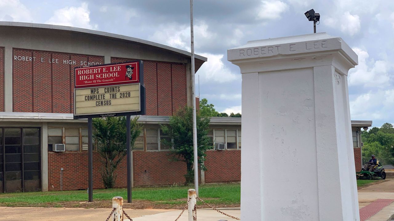 A pedestal that held a statue of Robert E. Lee stands empty outside a high school named for the Confederate general in Montgomery, Ala. on Tuesday, June 