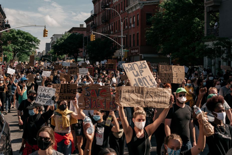 Demonstrators march through Brooklyn, New York, on June 3.