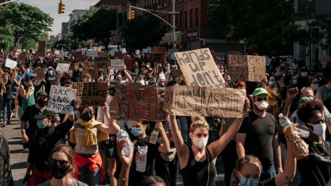 Protesters against police brutality march through Brooklyn on June 3 in New York City. 