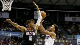 HONOLULU, HI - OCTOBER 03: Jerome Robinson #1 of the Los Angeles Clippers takes a running shot as he is defended by Thabo Sefolosha #18 of the Houston Rockets during the third quarter of the game at the Stan Sheriff Center on October 3, 2019 in Honolulu, Hawaii. TO USER: User expressly acknowledges and agrees that, by downloading and/or using this photograph, user is consenting to the terms and conditions of the Getty Images License Agreement. (Photo by Darryl Oumi/Getty Images)