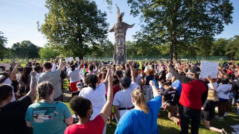 A peaceful protest in Paducah, Kentucky on Monday in front of the city's Chief Paduke statue.