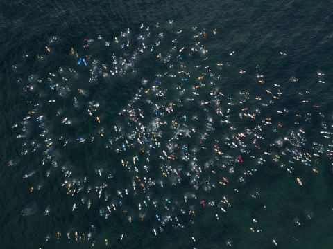 Hundreds of surfers in Encinitas, California, gather in support of Black Lives Matter on Wednesday, June 3.