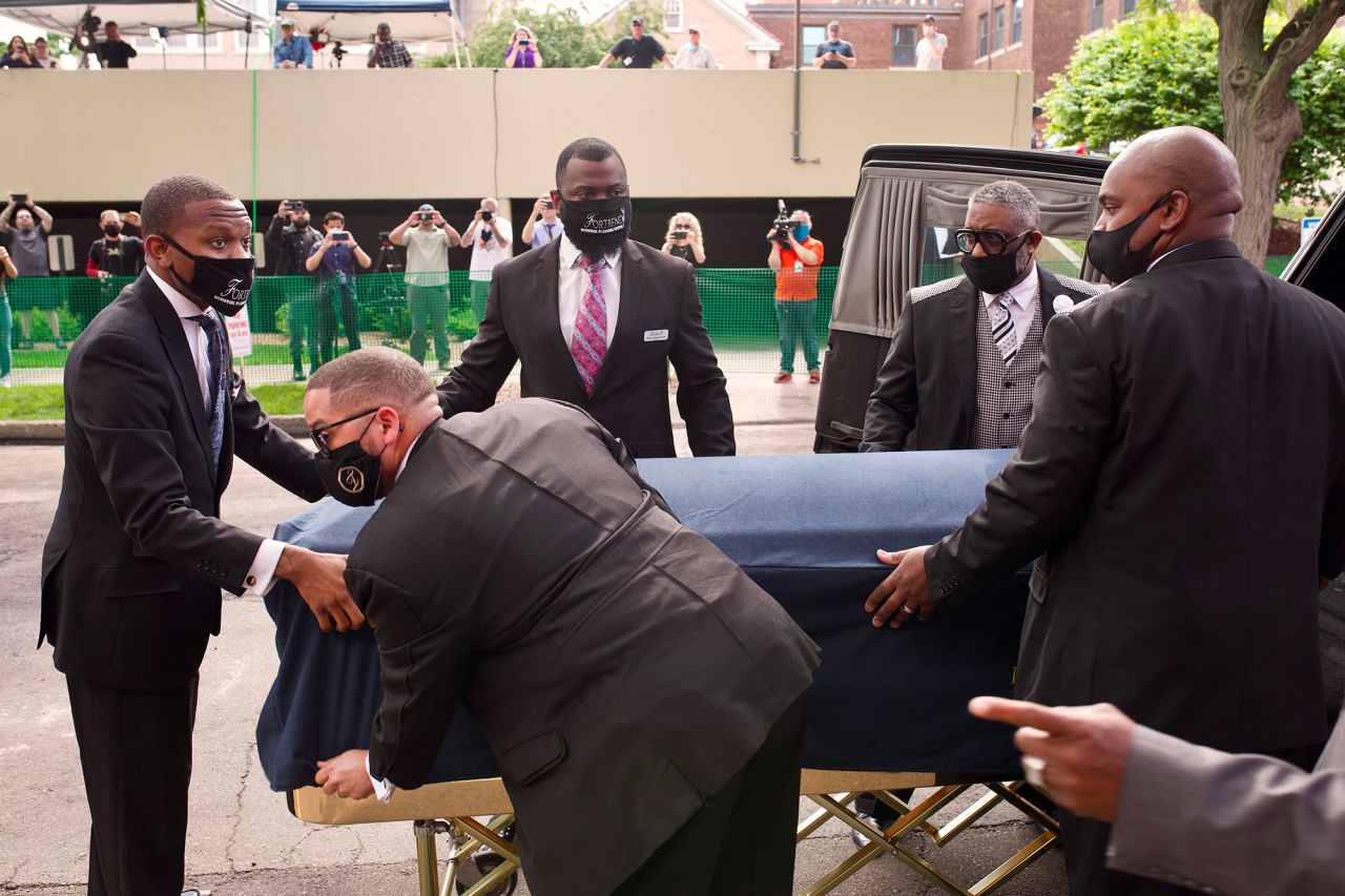 Floyd's casket is moved ahead of the service.
