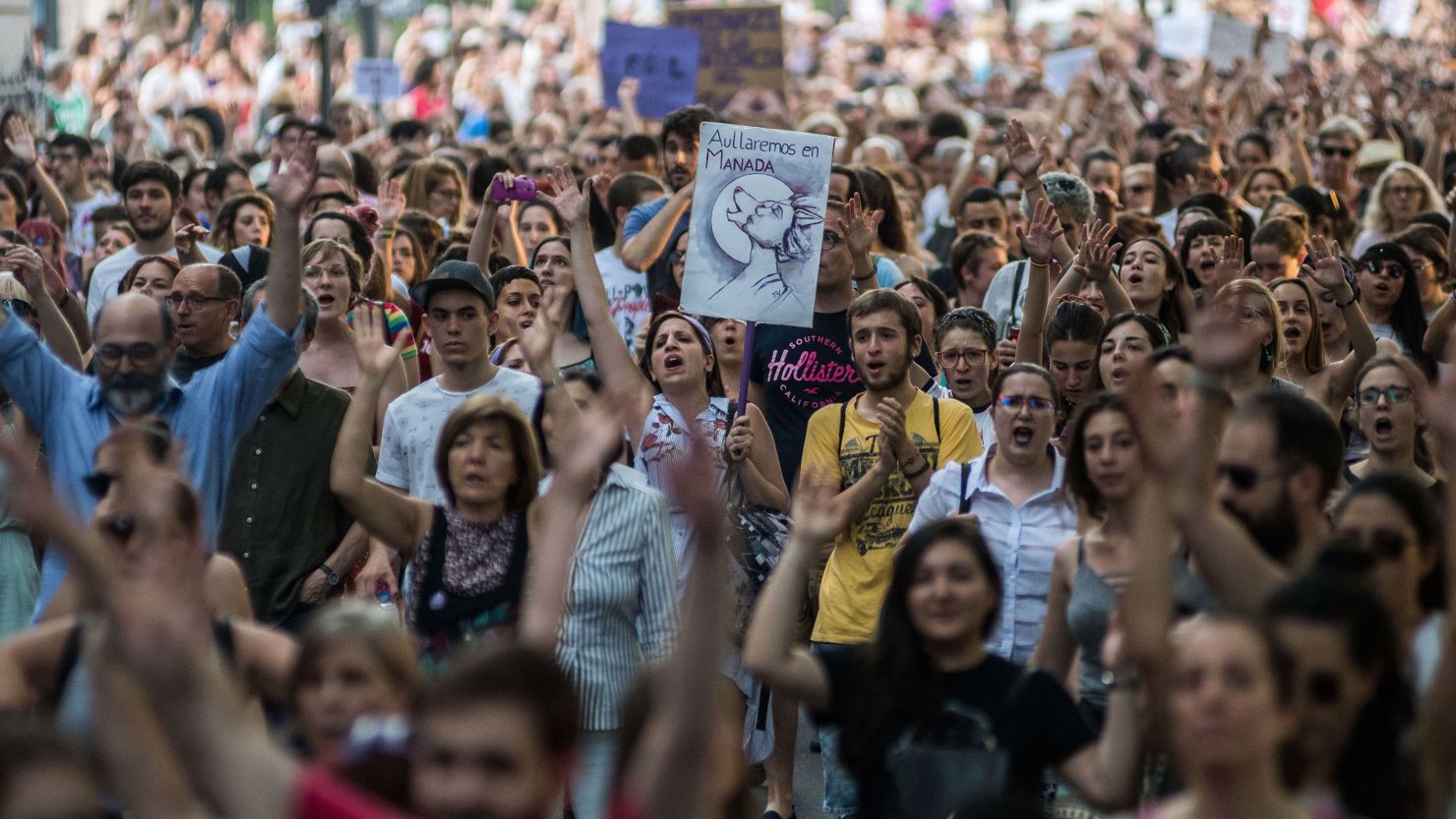 People in Madrid protest against a court's decision to release the "wolf pack" gang on bail on June 22, 2018.