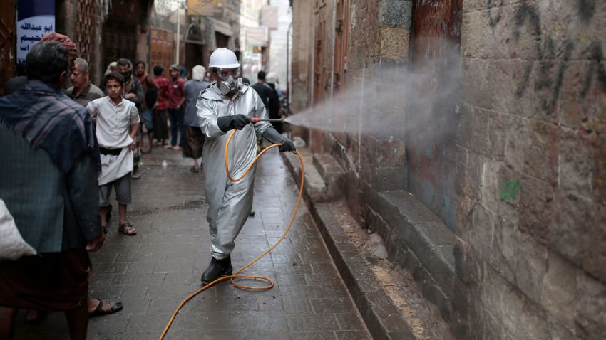 30 April 2020, Yemen, Sanaa: A health worker wearing a protective suit sprays disinfectant at a market in the old city of Sanaa, amid concerns of the spread of the coronavirus (COVID-19). Photo by: Hani Al-Ansi/picture-alliance/dpa/AP Images