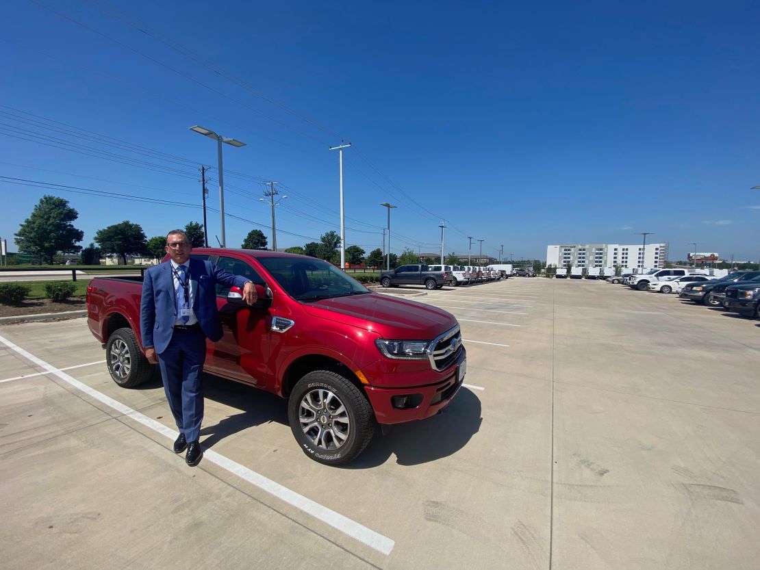 Brian Huth of Sam Pack's Five Star Ford in Texas stands next to one of the few Ford Rangers he has left to sell.