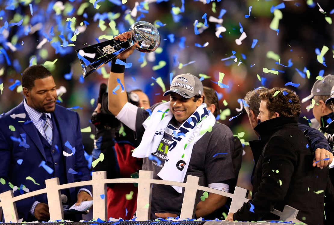Wilson celebrates with the Vince Lombardi trophy after defeating the Denver Broncos 43-8 in Super Bowl XLVIII in 2014. 