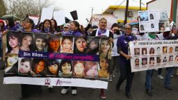 Women hold signs of disappeared and killed women during a march to commemorate the International Women's Day, in Ciudad Juarez, Chihuahua, on March 8, 2020. - People around the globe are taking action to mark International Women's Day and to push for action to to obtain equality. (Photo by HERIKA MARTINEZ / AFP) (Photo by HERIKA MARTINEZ/AFP via Getty Images)
