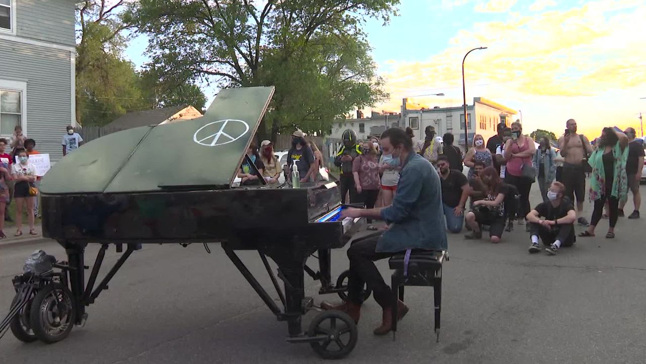 Davide Martello a german man living in Oklahoma city drove 12 hours to Minneapolis and brought a piano to the memorial for George Floyd to try to help heal the community with music.