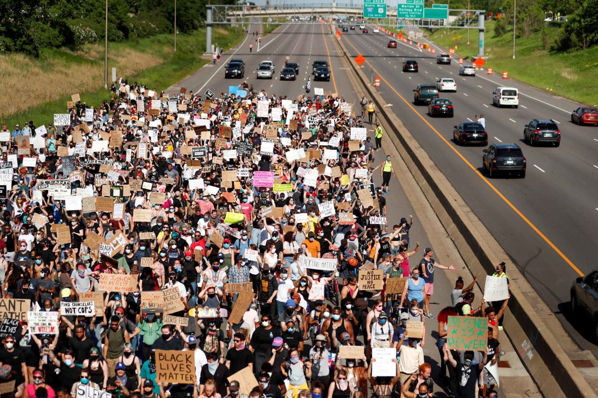 Protesters rally on a highway in St. Paul, Minnesota, on Sunday, May 31.