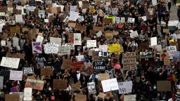 Protesters march Thursday, June 4, 2020, in San Diego. Protests continue to be held in U.S. cities, sparked by the death of George Floyd, a black man who died after being restrained by Minneapolis police officers on May 25. 