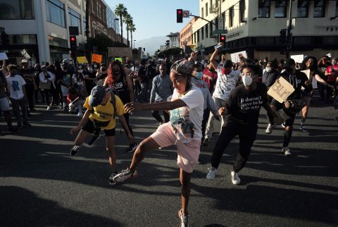 People dance in the street during a protest in Pasadena, California, on June 4.