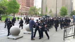 A video image shows police pushing a man, 75, during a demonstration in Buffalo, New York, on Thursday.
