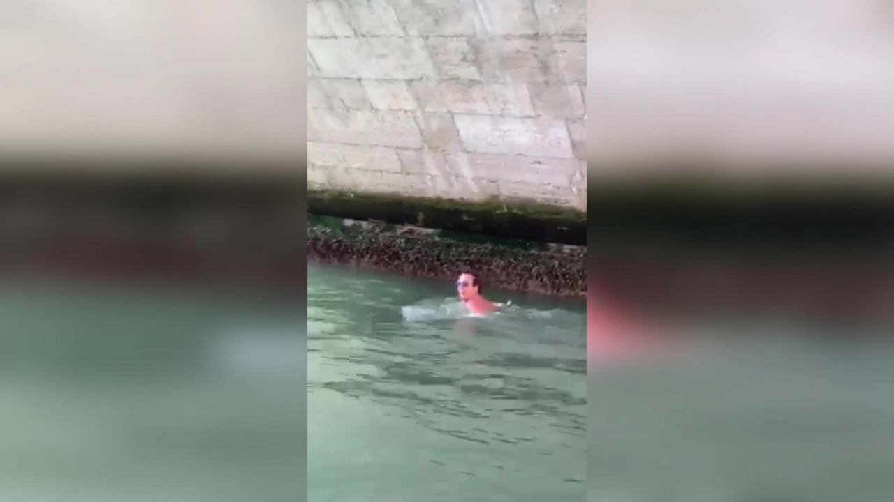 The men undressed and jumped into the canal, police told CNN.