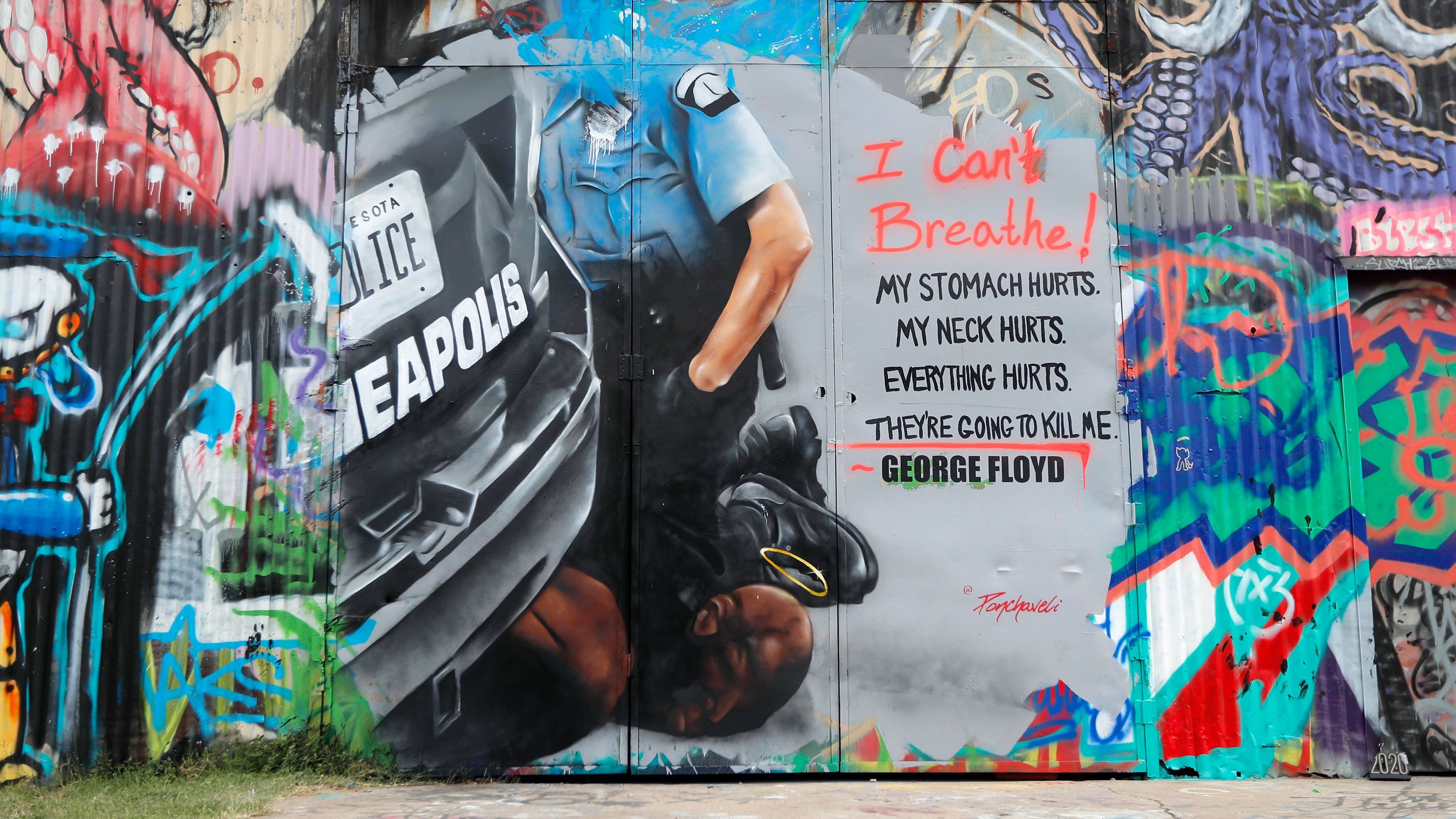 This mural in Dallas, painted by Theo Ponchaveli, depicts police officer Derek Chauvin with his knee on Floyd's neck.
