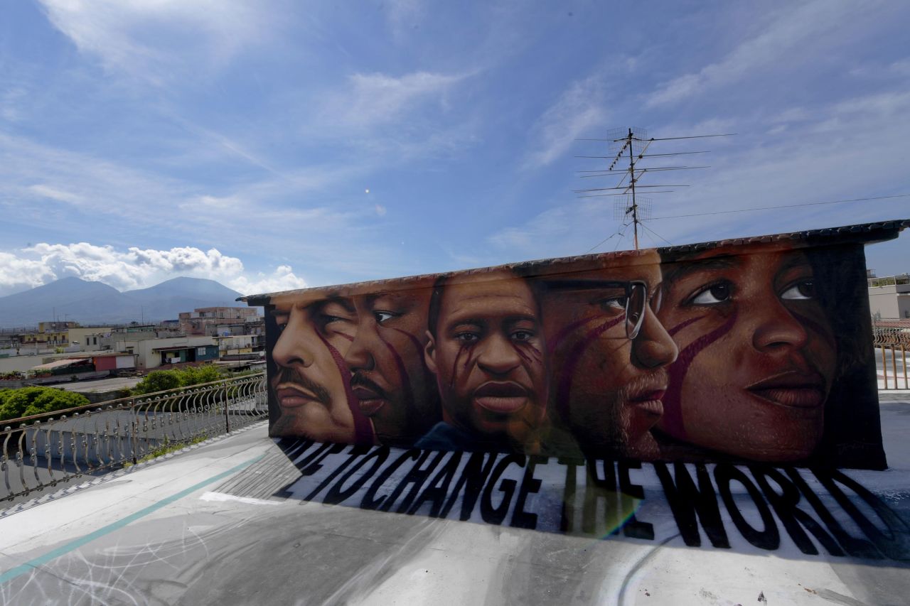 Floyd is seen at the center of this mural painted by street artist Jorit Agoch in Naples, Italy. The faces, from left, are Vladimir Lenin, Martin Luther King Jr., Floyd, Malcolm X and Angela Davis.