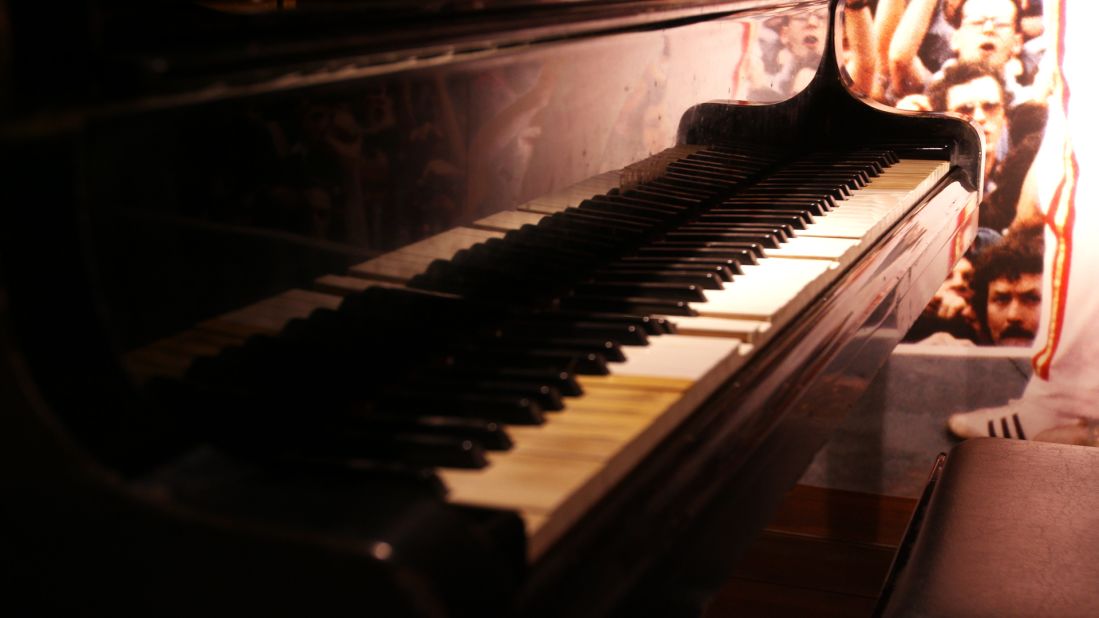 The centerpiece of the museum is this black piano, which Freddie Mercury played as a child.