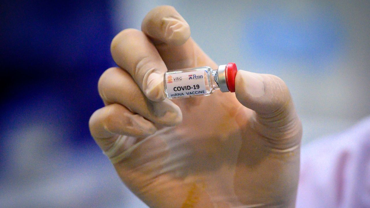 This picture taken on May 23, 2020 shows a laboratory technician holding a dose of a COVID-19 novel coronavirus vaccine candidate ready for trial on monkeys at the National Primate Research Center of Thailand at Chulalongkorn University in Saraburi. - After conclusive results on mice, Thai scientists from the centre have begun testing a COVID-19 novel coronavirus vaccine candidate on monkeys, the phase before human trials. (Photo by Mladen ANTONOV / AFP) (Photo by MLADEN ANTONOV/AFP via Getty Images)