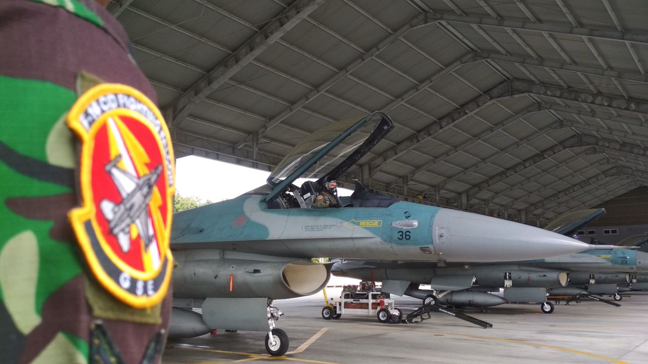 An Indonesian air force pilot prepares for taking off in an F-16 at an air base in Pekanbaru, Riau on January 7, to deploy near the Natuna Islands.