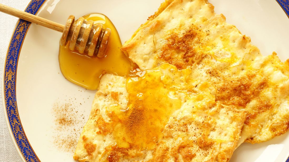 <strong>Matzo brei: </strong>Brought to the US by Jewish immigrants from Eastern Europe this holiday dish is made from crumbled matzo (unleavened flatbread), soaked in water and then beaten with eggs. 