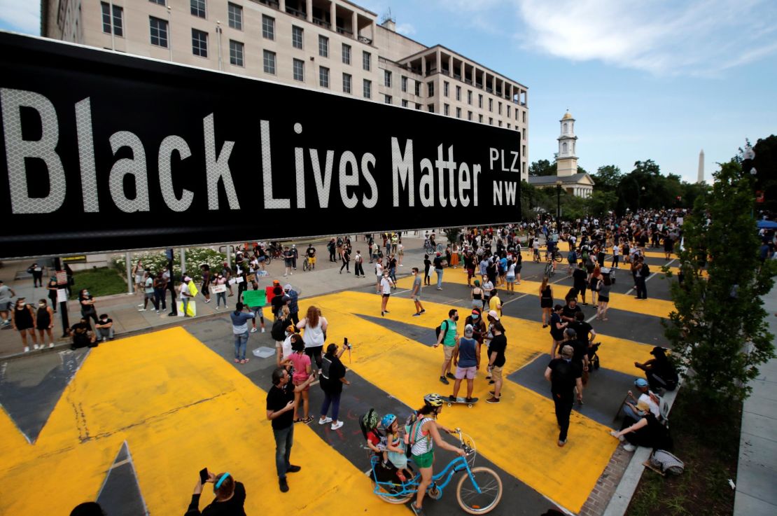 A street sign of Black Lives Matter Plaza is seen near St. John's Episcopal Church, as the protests against the death of George Floyd while  in Minneapolis police custody  continue.