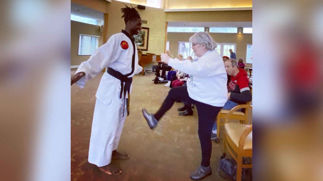 In a photo taken pre-social distancing, Wall teaches senior citizens karate as a way to keep healthy. 