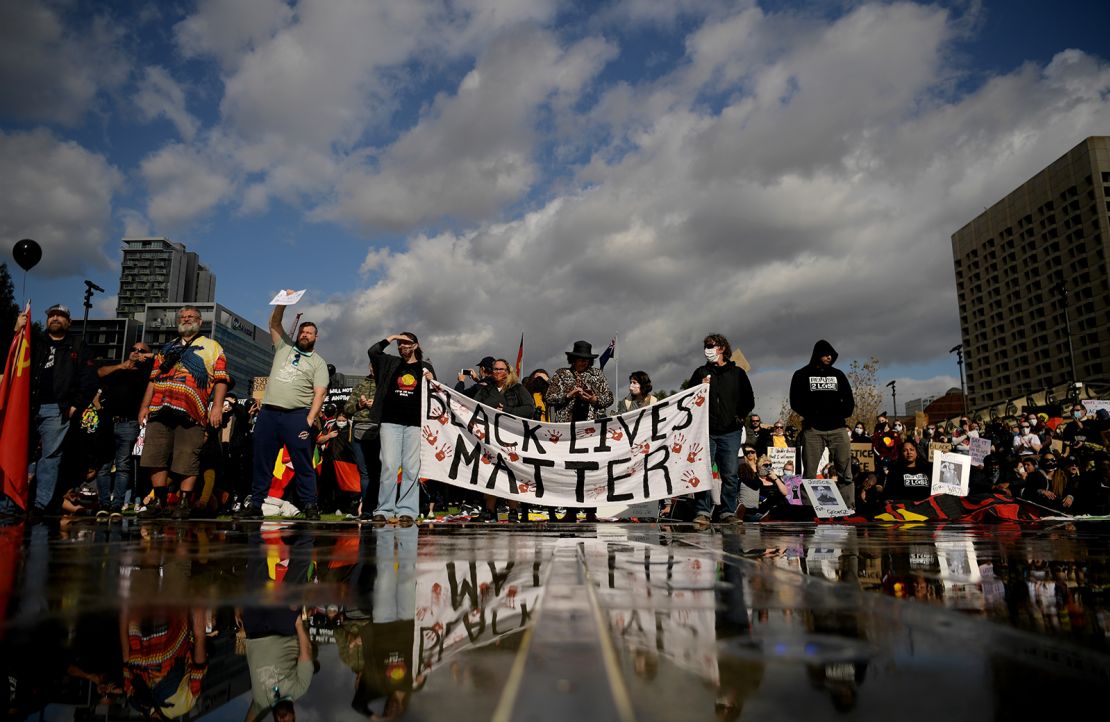 Protesters march in Adelaide, Australia.