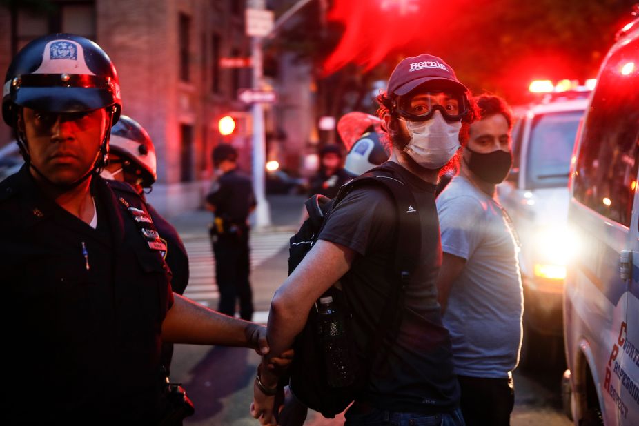 Protesters are arrested after violating curfew in New York on June 5.